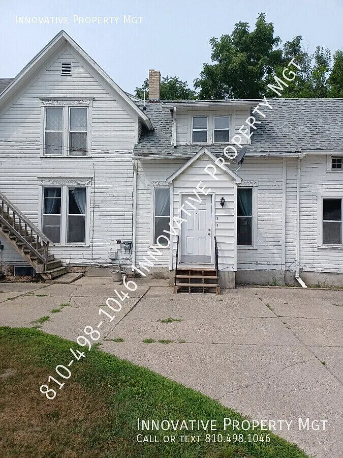 Large 3-bedroom multi-dwelling unit located in Clio! — Photo 1