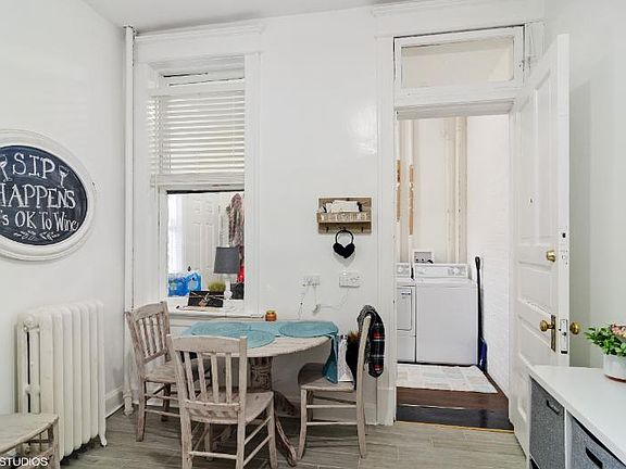 Kitchen/Dining room facing the back entry/laundry room.