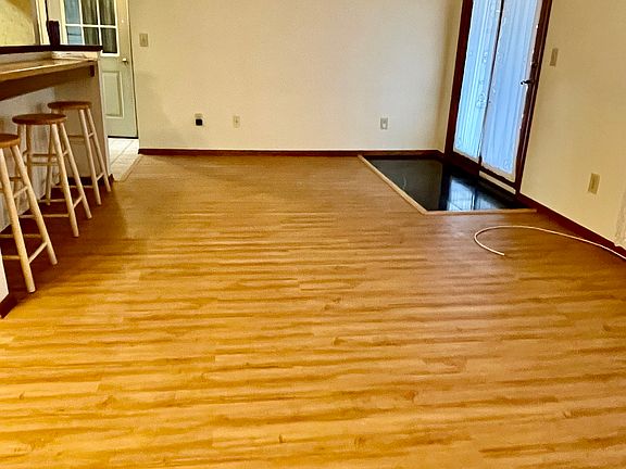 Living room. Door opens to deck