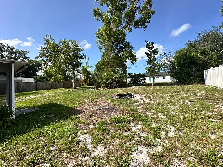 Partially-fenced in backyard