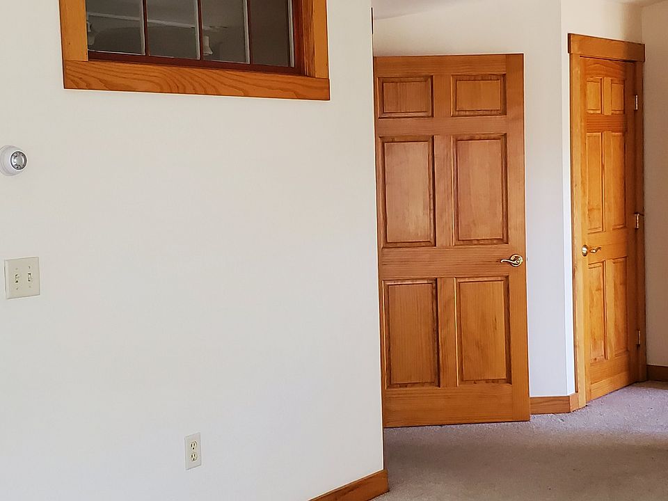 Window to left provides nice natural light to the bedroom