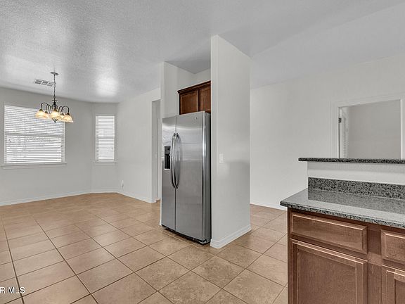 5th image of 14304 S Cave Ave