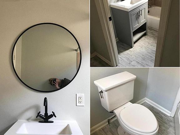 Updated bathroom, new vanity, floor, toilet, paint and fixtures.