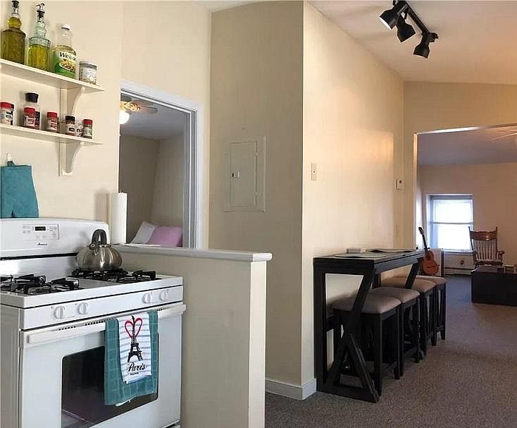 Open kitchen and living room. PLEASE READ DESCRIPTION FOR START DATE AND LENGTH OF LEASE!