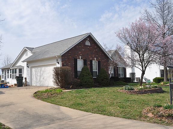 Driveway side front of house