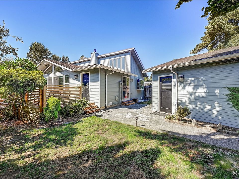 Sunny yard leads you to the front door>