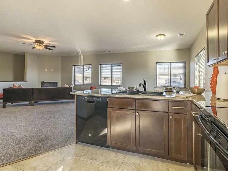 Cook and connect in our modern kitchens with granite countertops, sleek cabinetry, and plenty of room for meal preparation.