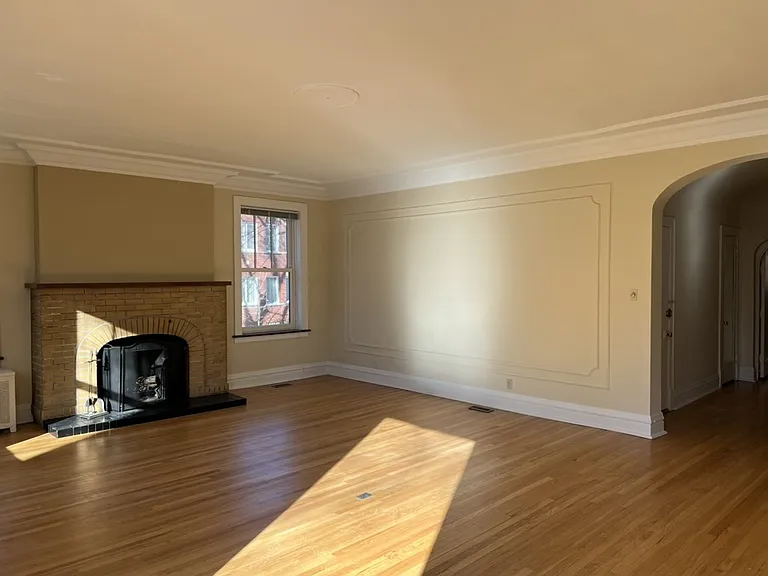 Living room with wood-burning fireplace