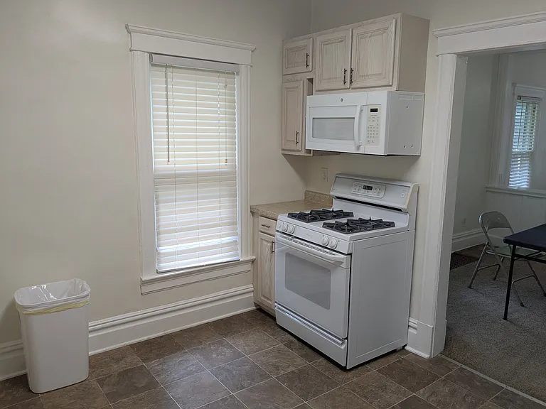 Kitchen
(And door to dining room)
(Table and chairs not included)