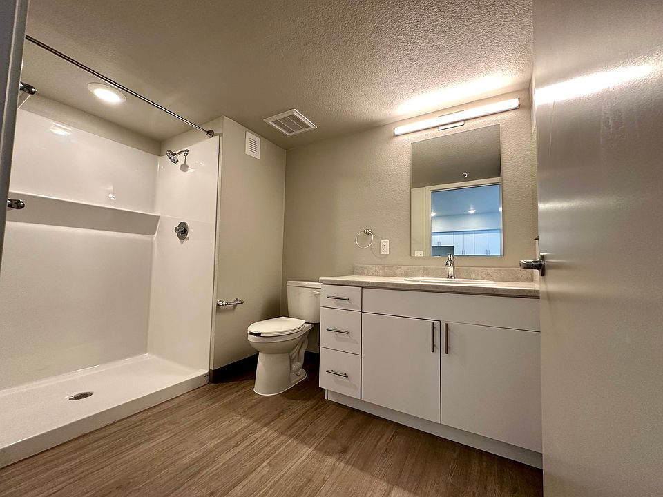 Bathroom in one-bedroom unit, and similar to studio unit bathroom.