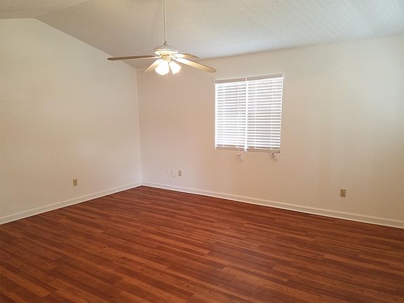 Living room with cathedral ceiling.