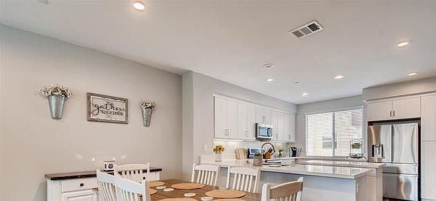 Dining area is next to the kitchen & living room