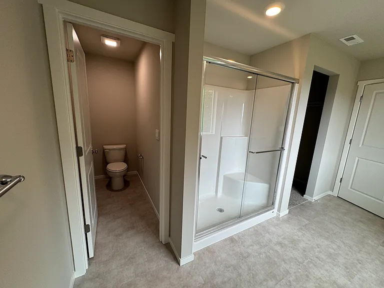 Master bathroom. Door to the right is entrance to master bedroom.