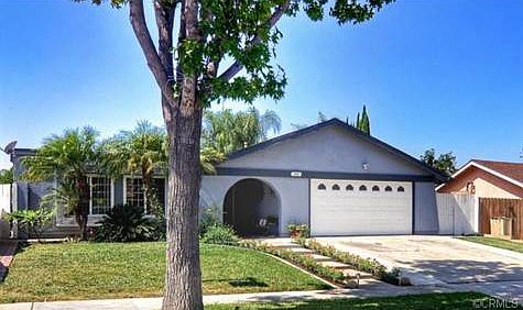 Great curb appeal with a nice fron yard