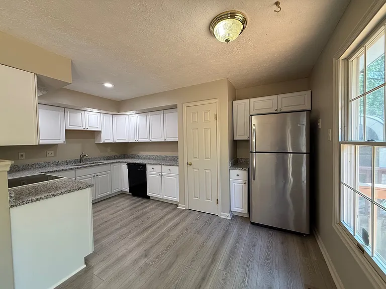 Beautiful newly renovated kitchen upgrade white cabinets and granite counter tops and new floors