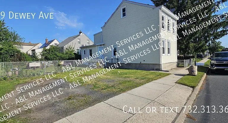 159 Dewey Ave — Photo 1