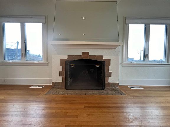 Wood-burning fireplace with amazing views.