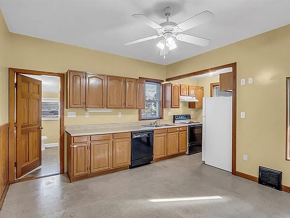 large eat-in kitchen 
(will have updated flooring)