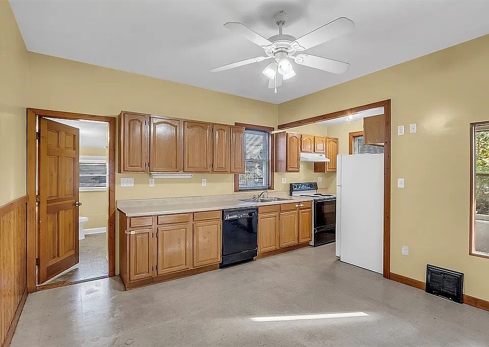 large eat-in kitchen 
(will have updated flooring)