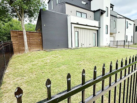 Gated grassy yard