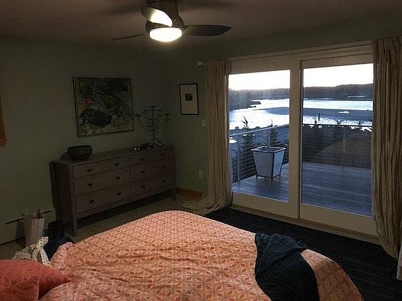 master bed with sliders out to ocean