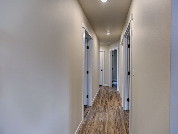 Hall to Bedrooms, Laundry, Baths