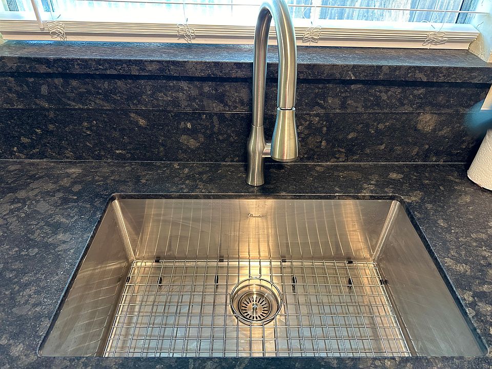 New stainless steel sink and faucet