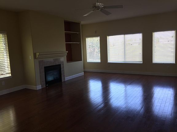 family room, lots of windows and lights