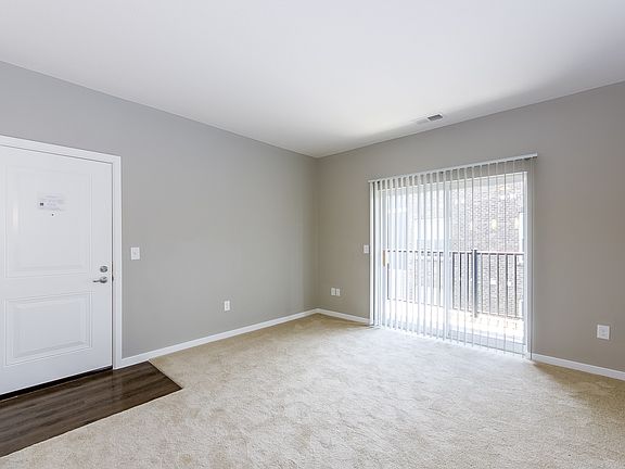 Living room showing private balcony