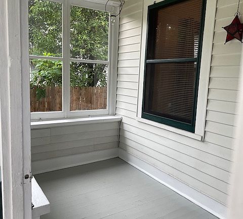 Front porch. The window on the right looks into the main tv room.