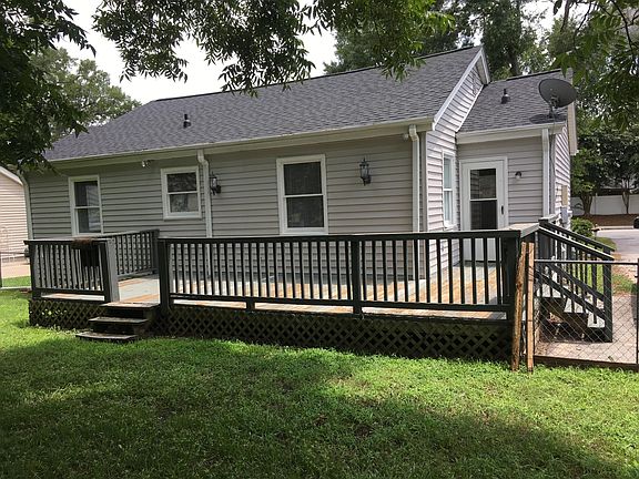 Back w/ Deck, Driveway on right 