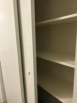 Linen closet in hallway
