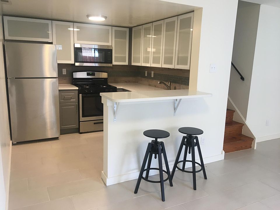 Full open kitchen with stainless steel appliances