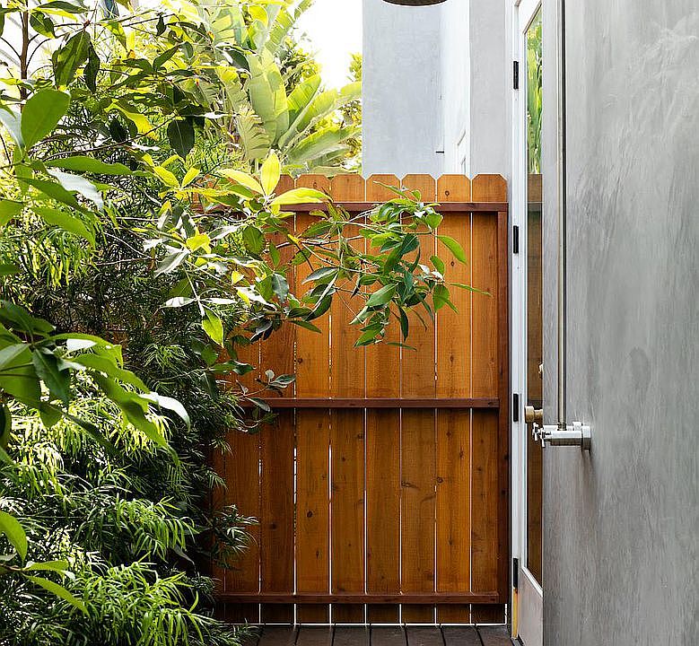 Wooden deck gate and outdoor shower at 633 Palms Blvd. apartments in Venice, California.