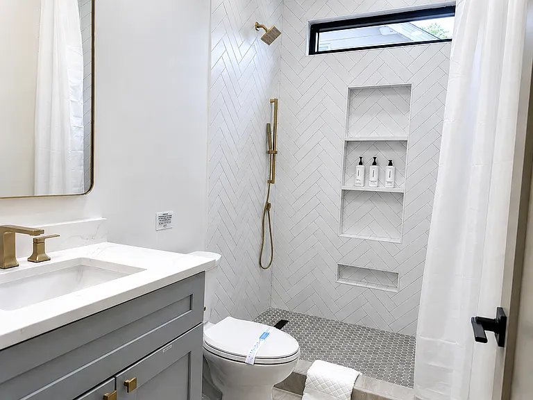 Spacious closet in the Kirkwood Suite, stocked with everything you need for your stay including hangers, laundry baskets, extra bedding, pillows and towels.