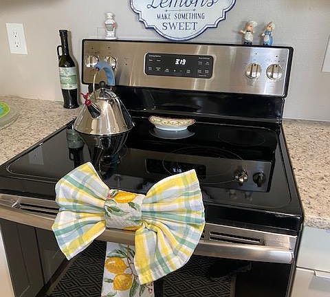 Nice spacious galley kitchen with double pantry and full size Samsung refrigerator.