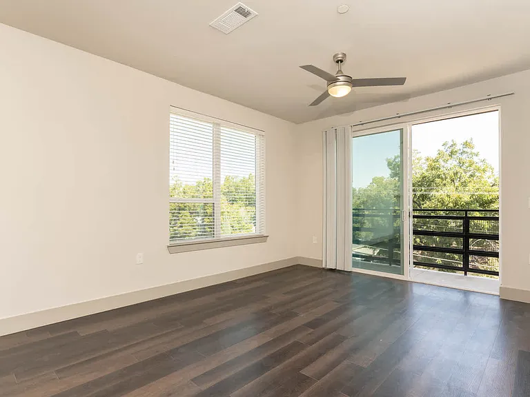 Living Room with Balcony and Hard Surface Flooring