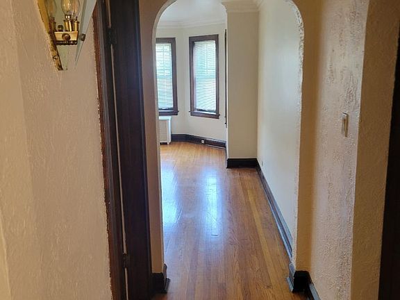 Entry to Living Room and First Bedroom
