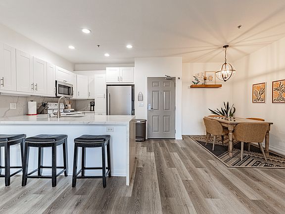 Open concept living room, dining, kitchen