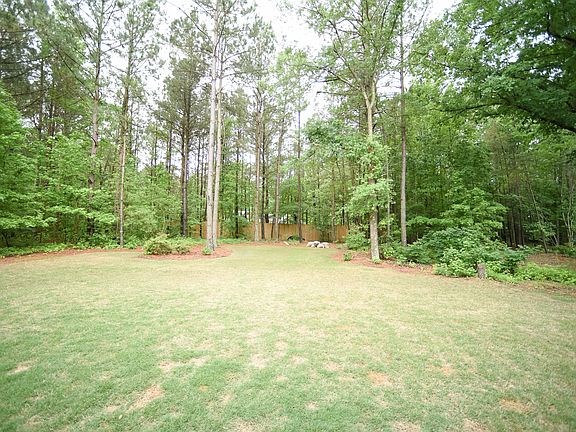 HUGE Wooded Back Yard. 