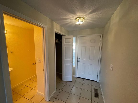 Entry closet and powder room.