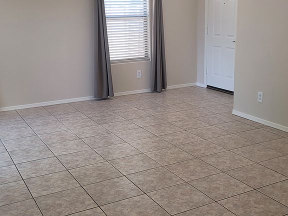 LIVING ROOM AND FRONT DOOR