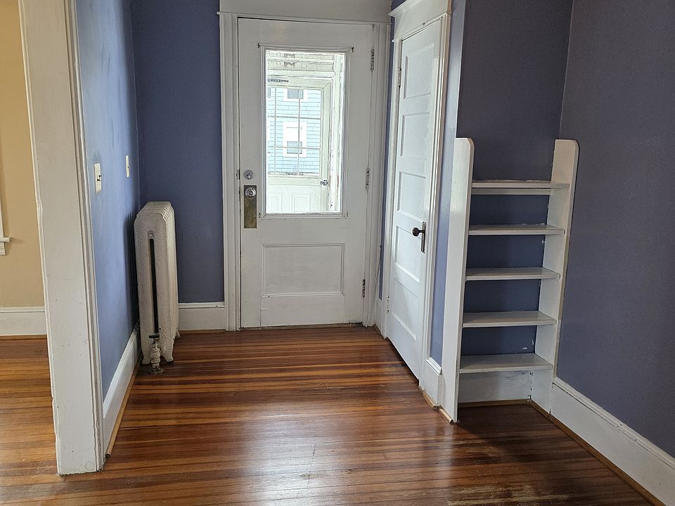 front entrance with closet and built in shelving