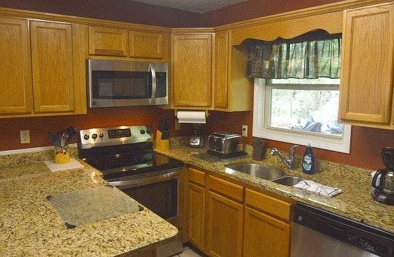 Kitchen with granite and stainless