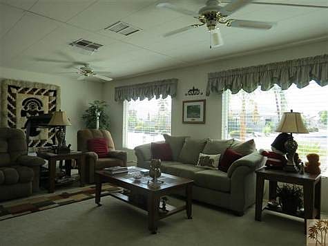 Living Room with front window views of mountains