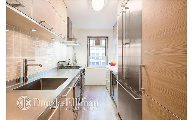 Sold by Douglas Elliman | media 18