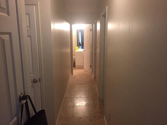 Hallway. Master to left, spare bath straight ahead, spare be