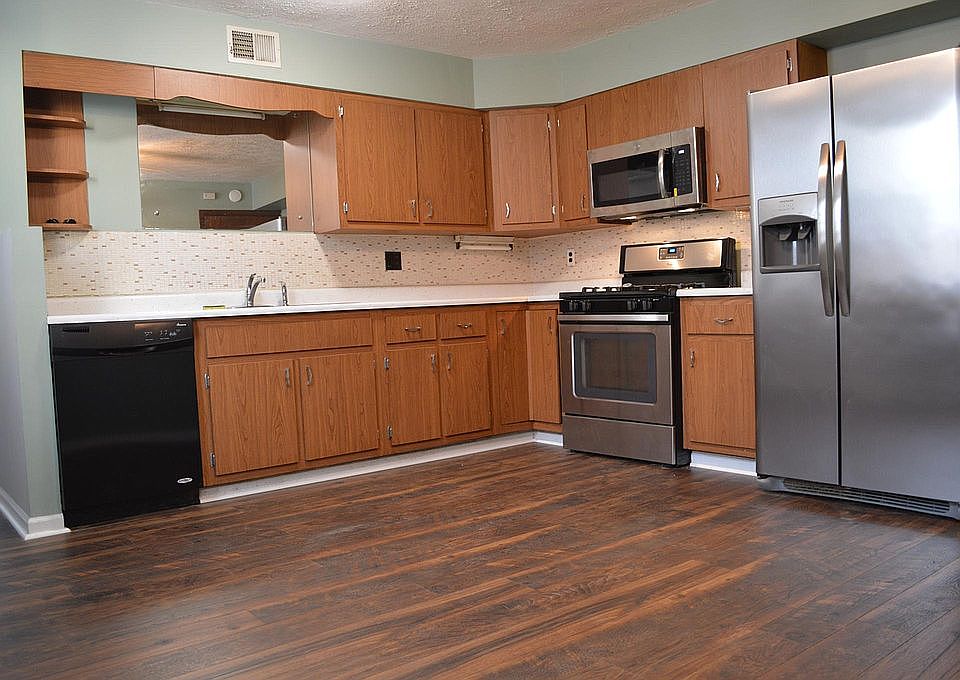 Kitchen with new over range microwave and floors