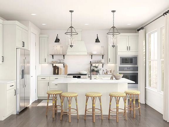 Kitchen with white cabinetry and floating shelves