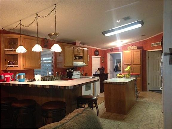 Another view of this great sized kitchen!!